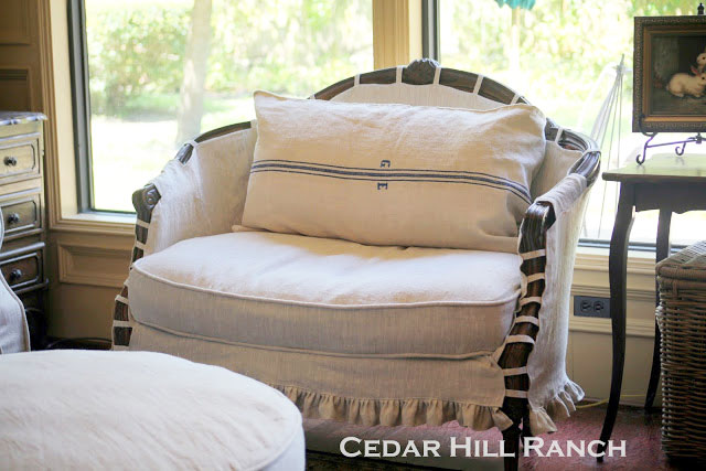 French loveseat with slipcover.