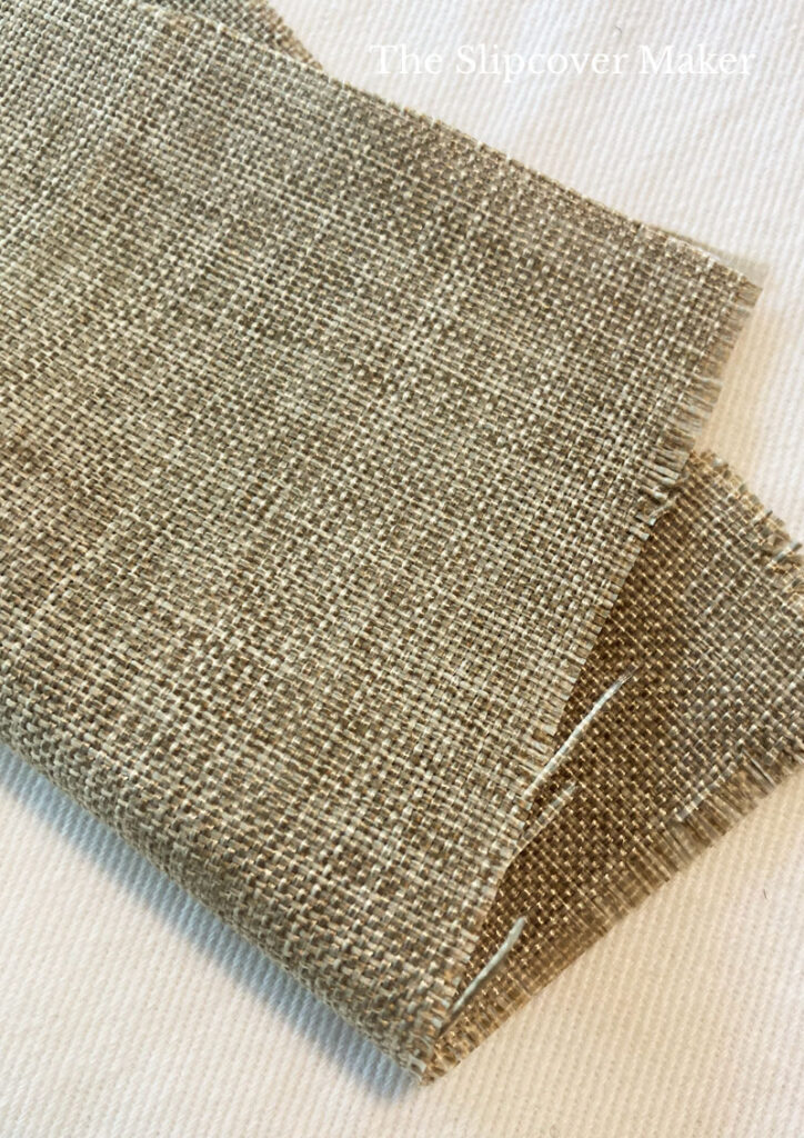 Textured brown polyester fabric swatch.