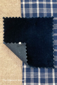 Dark blue thick velvet fabric.