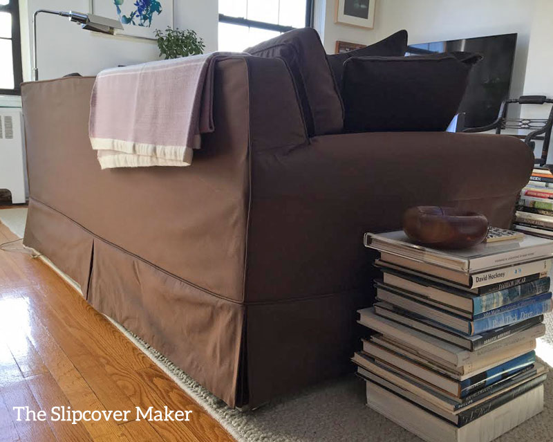 Chocolate brown silk sofa slipcover back view.