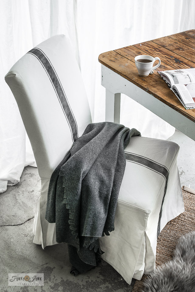 Stenciled stripe on dining chair slipcover.