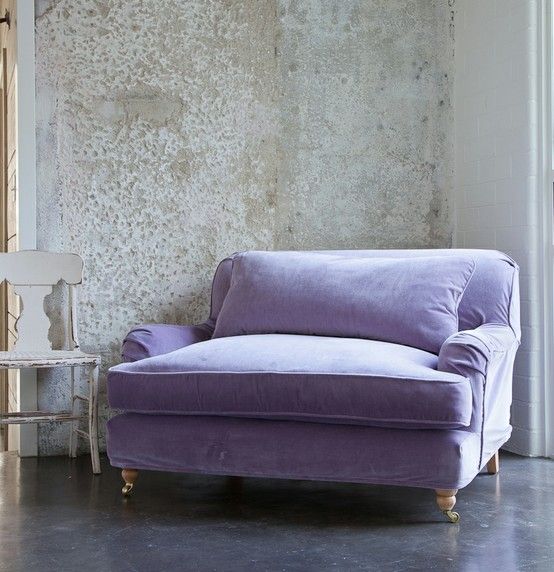 Lavender velvet slipcover on big cushy chair.