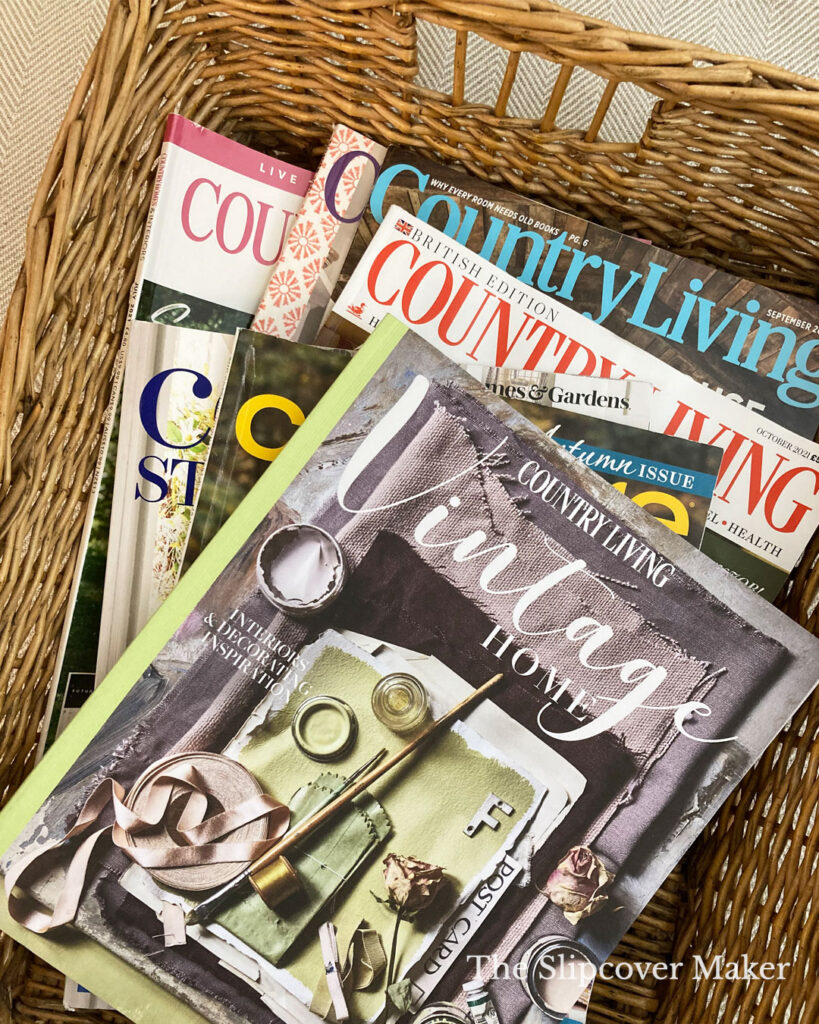 Basket of Country Living magazines.