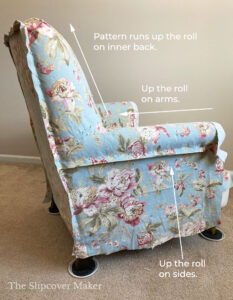 Floral fabric placement on chair slipcover.