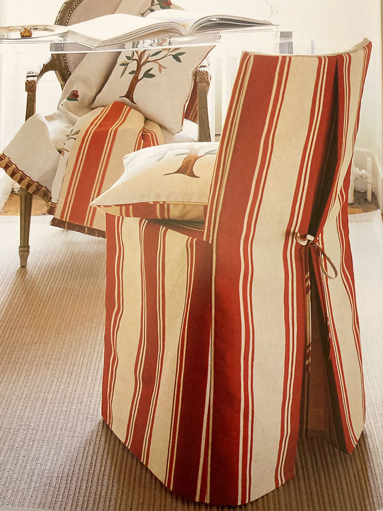 Red and cream stripe chair slipcover.