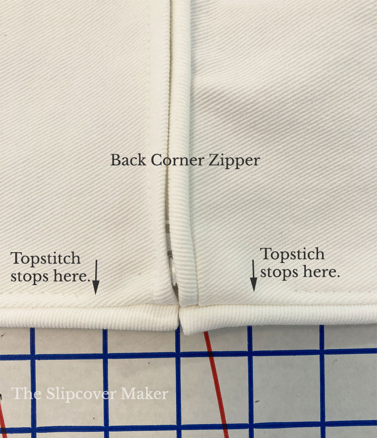 Hem stitch on white slipcover.