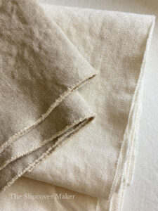 Hemp slipcover canvas in natural and taupe colors.