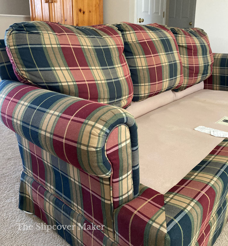 Old Lazy Boy sofa with attached back cushions.