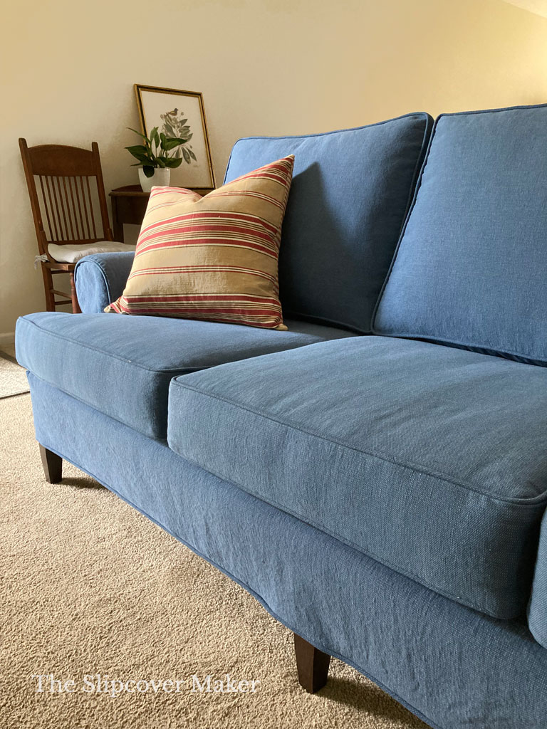 Blue canvas slipcover for sofa.