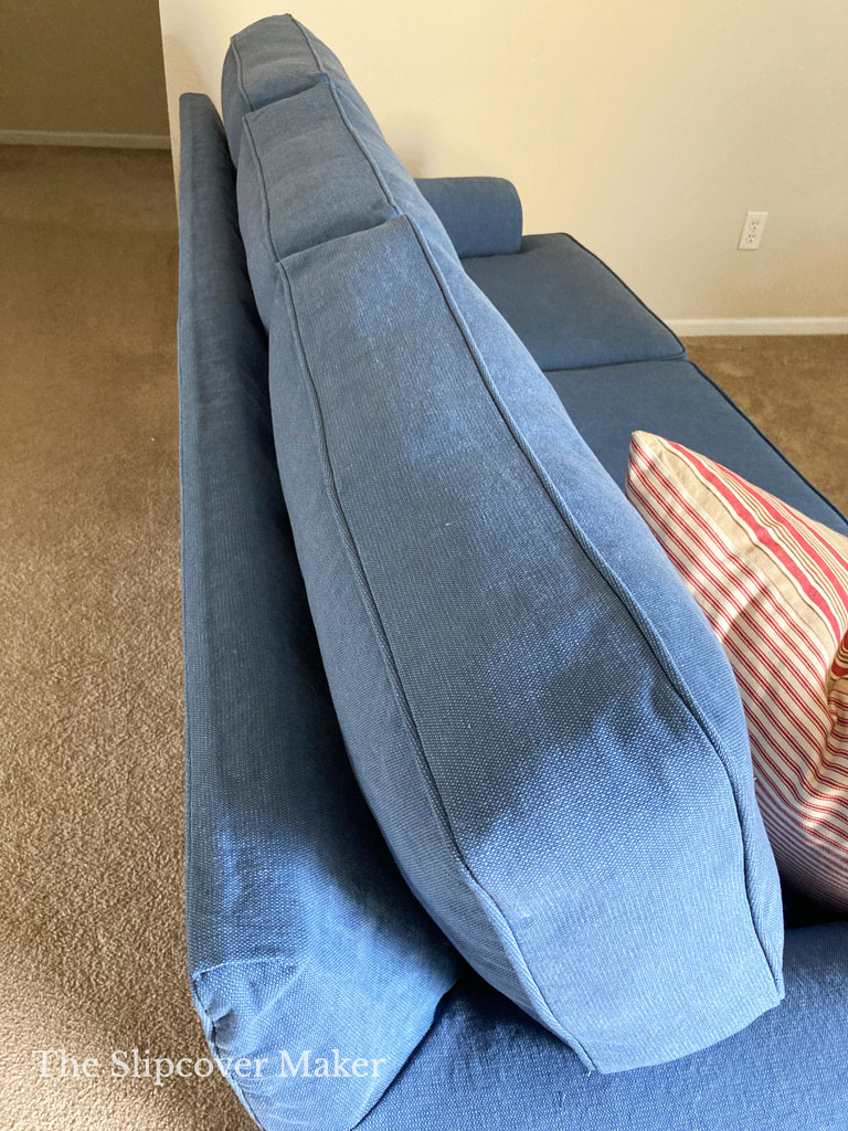 New blue canvas slipcovers for sofa back cushions.