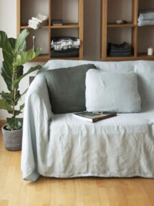 Loose fit linen sofa cover.