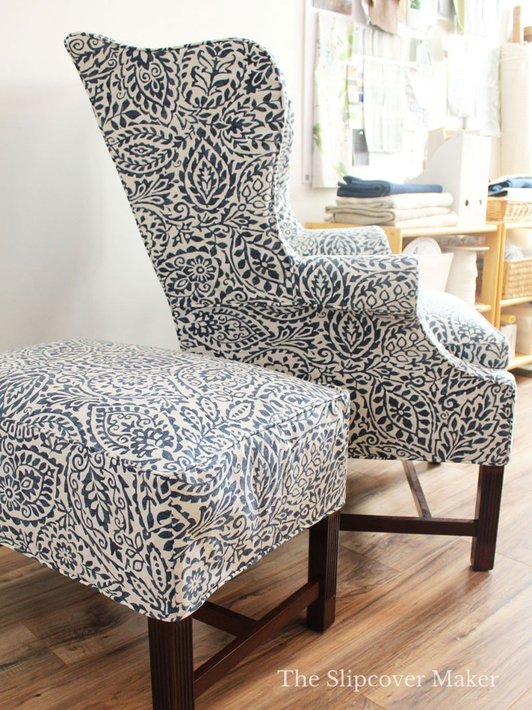 Blue and white leaf print cotton slipcover on wingback chair.