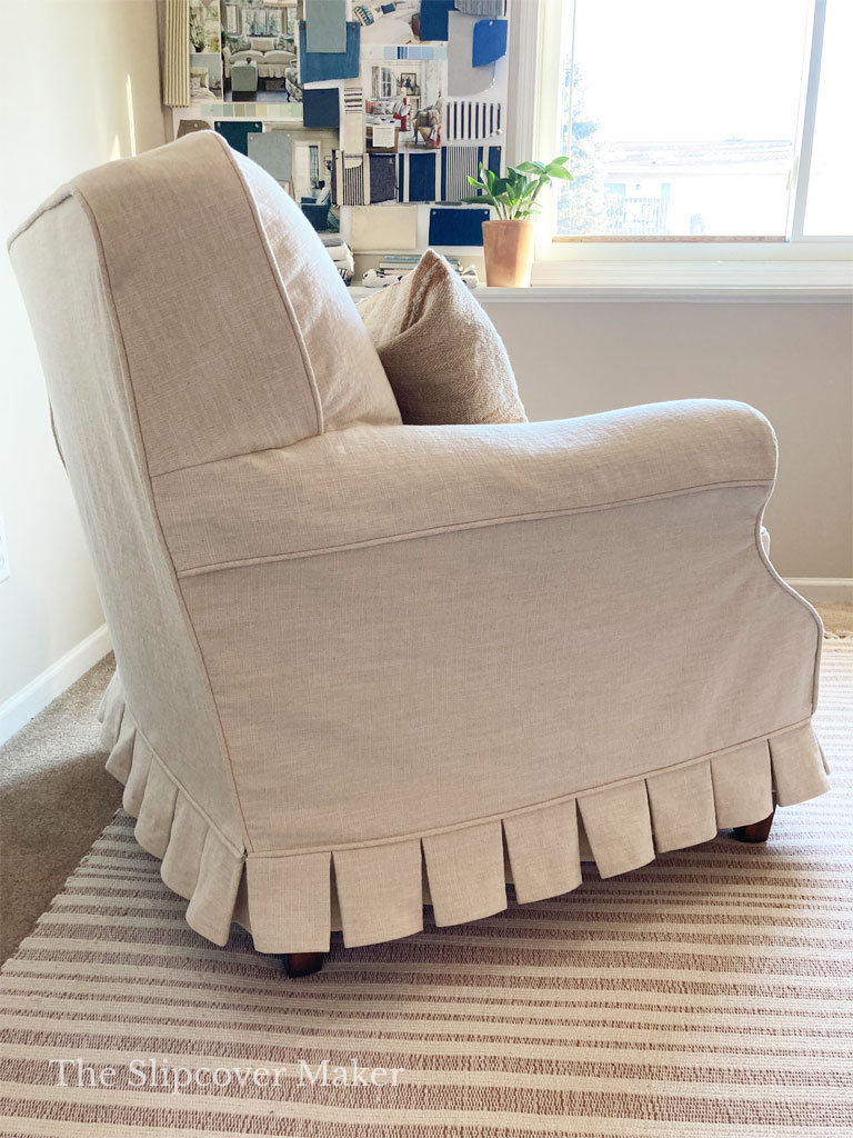 Club chair with natural cotton linen slipcover.