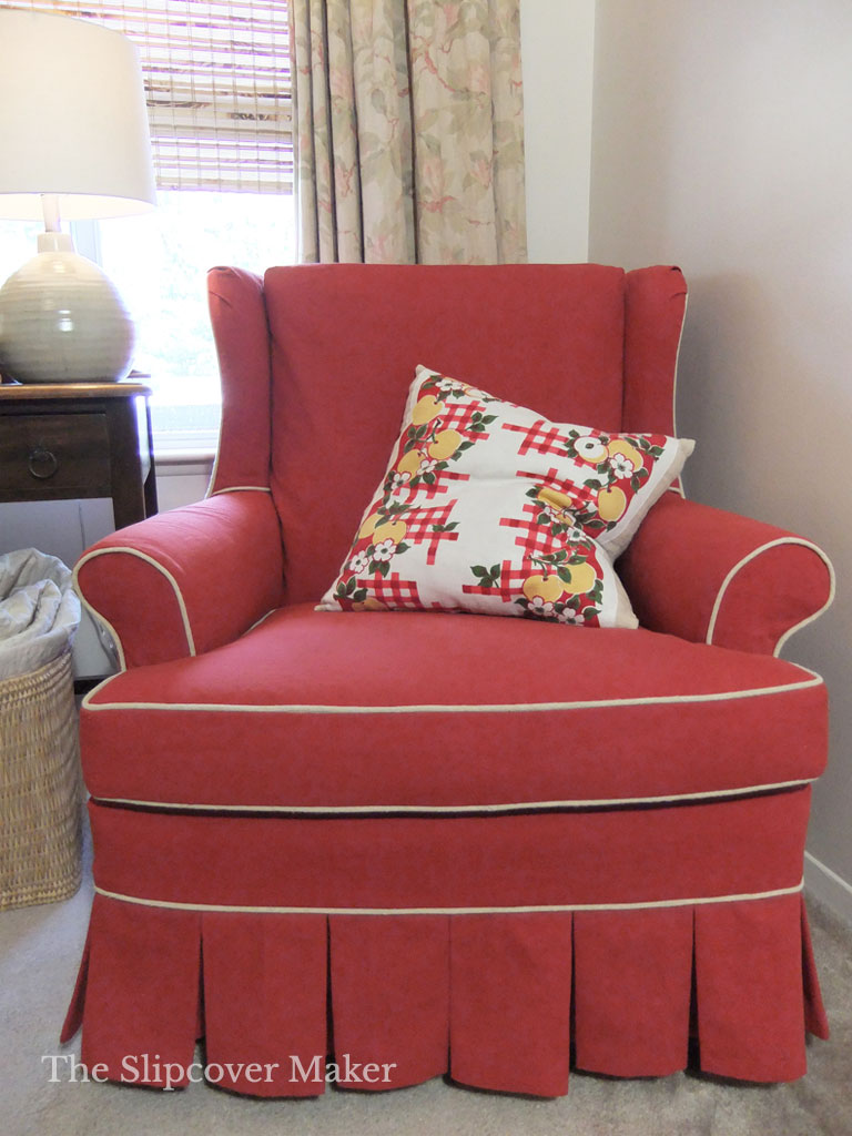 Red chair slipcover with natural hemp welt cord.