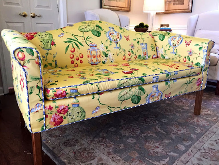 Yellow China lantern slipcover fabric on a vintage settee.