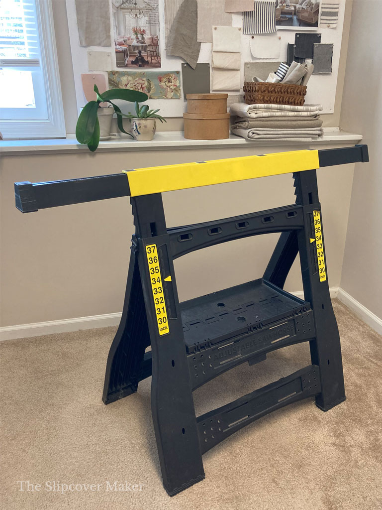 Alternative sawhorse for slipcover work table.