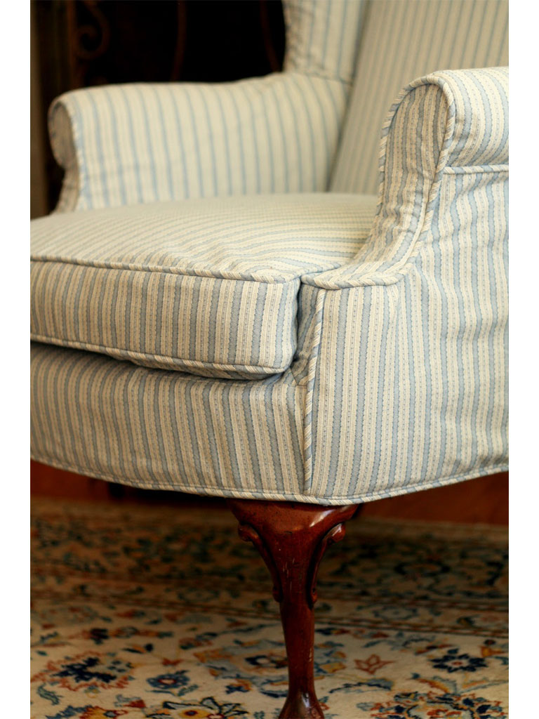 Stripe slipcovered wingback chair. 