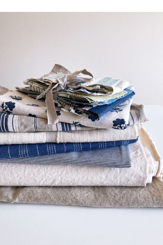 Stack of slipcover fabrics.