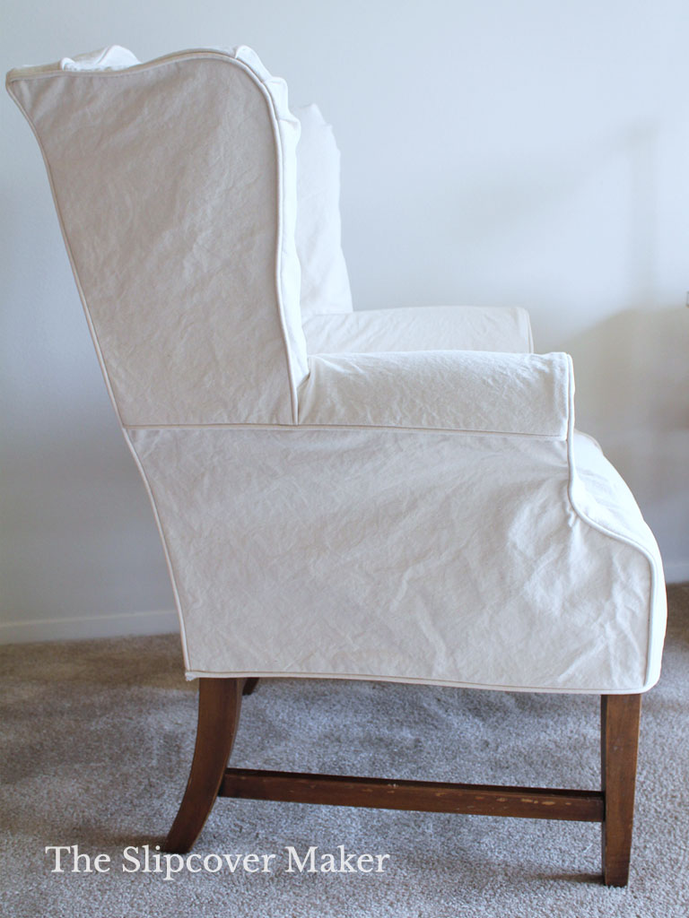 Natural canvas wingback chair slipcover.