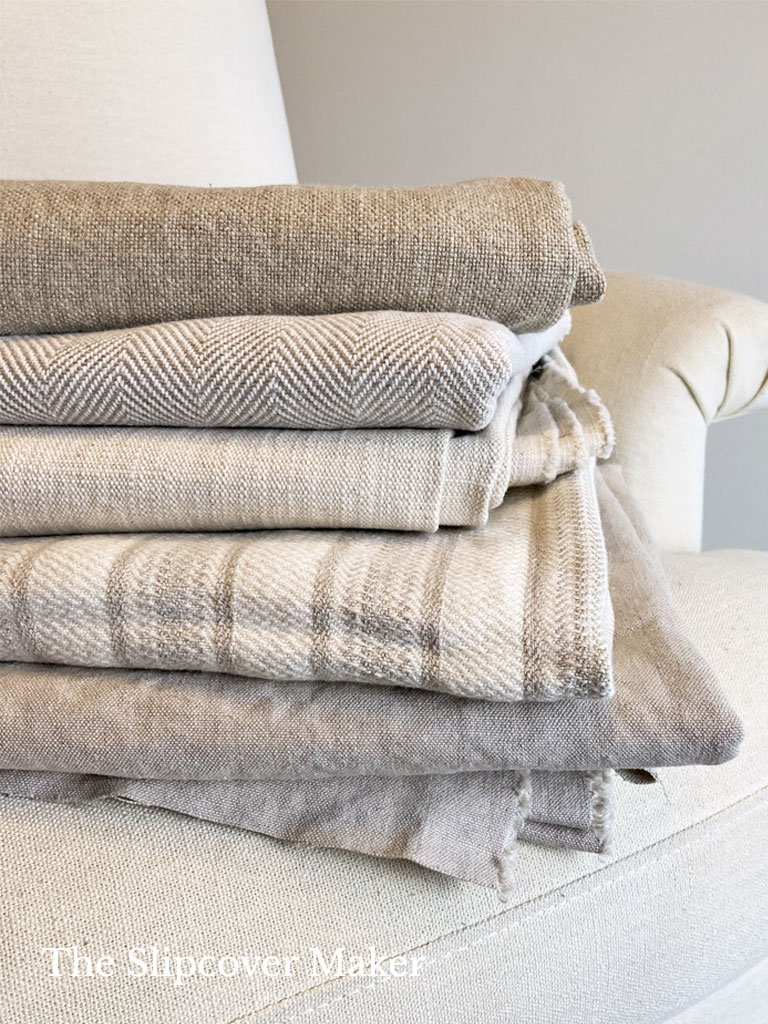 A stack of cotton, linen and hemp fabrics.
