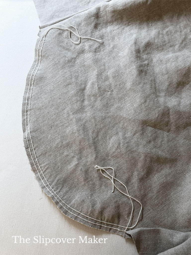 Hemp canvas with gathering strings around arm edges.