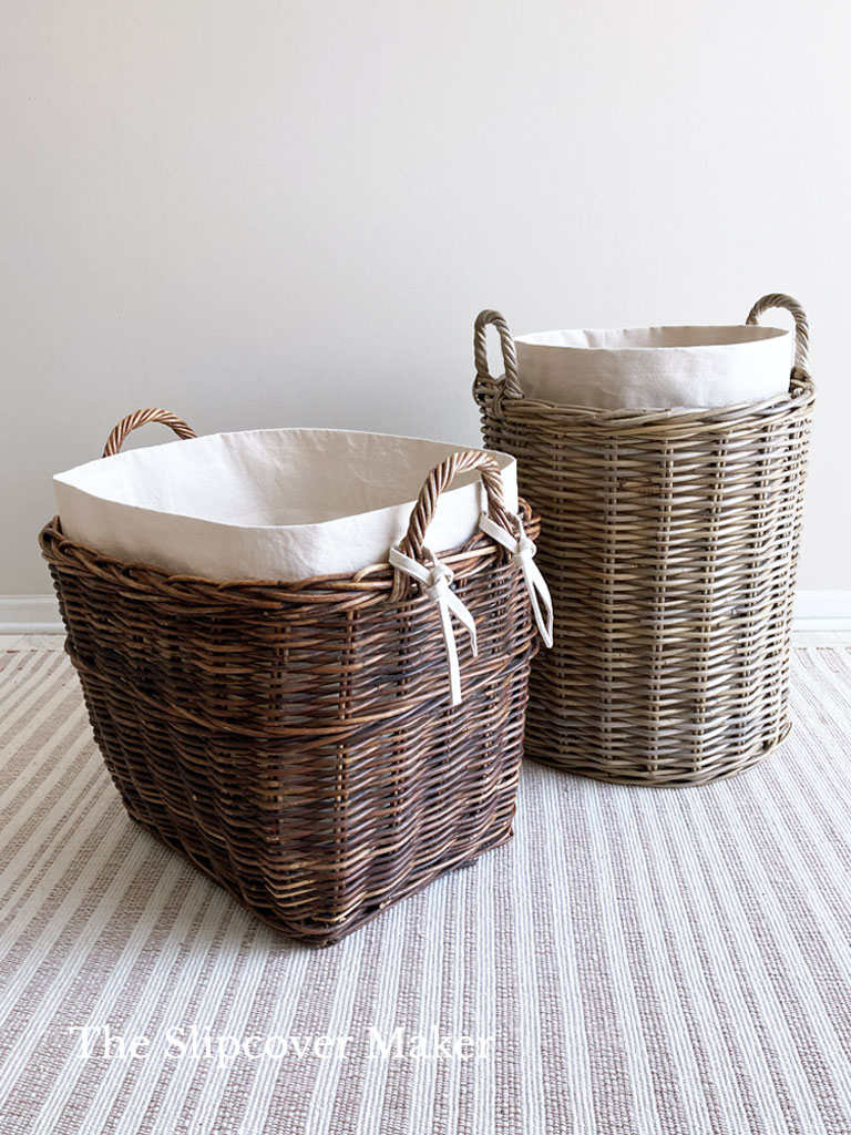 Large rattan baskets with cotton liners.