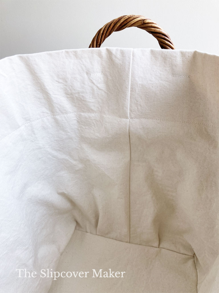 Rectangle basket canvas liner with tucks.