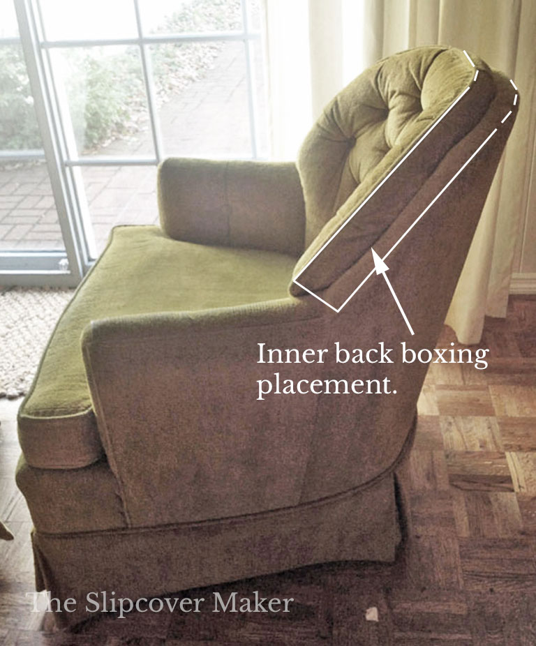 Boxing panel placement on green armchair.