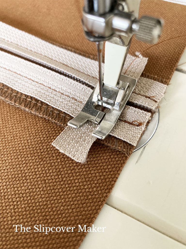 Stitch end of zipper panel.