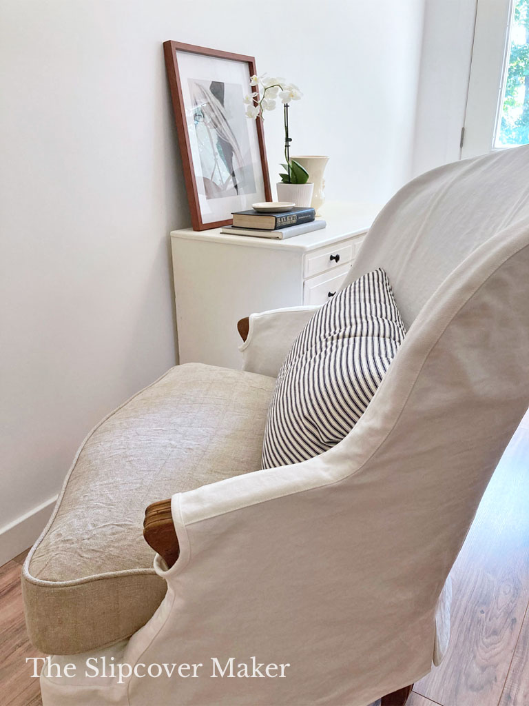 French chair slipcover with arm panels.