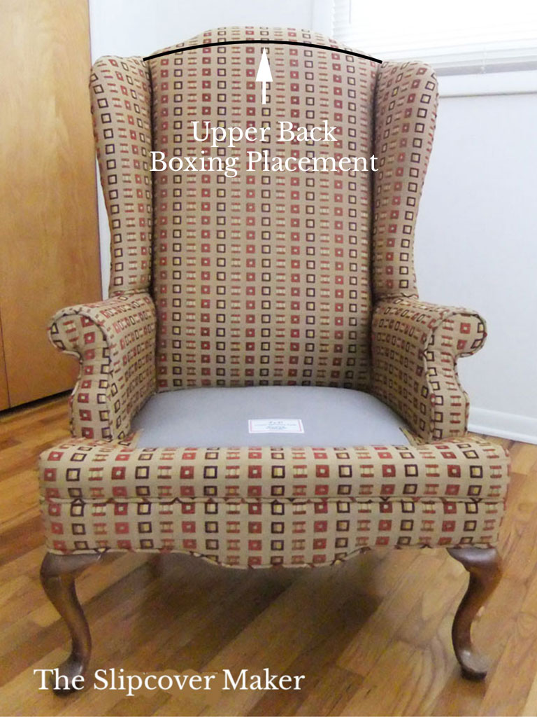 Boxing placement on wingback chair.