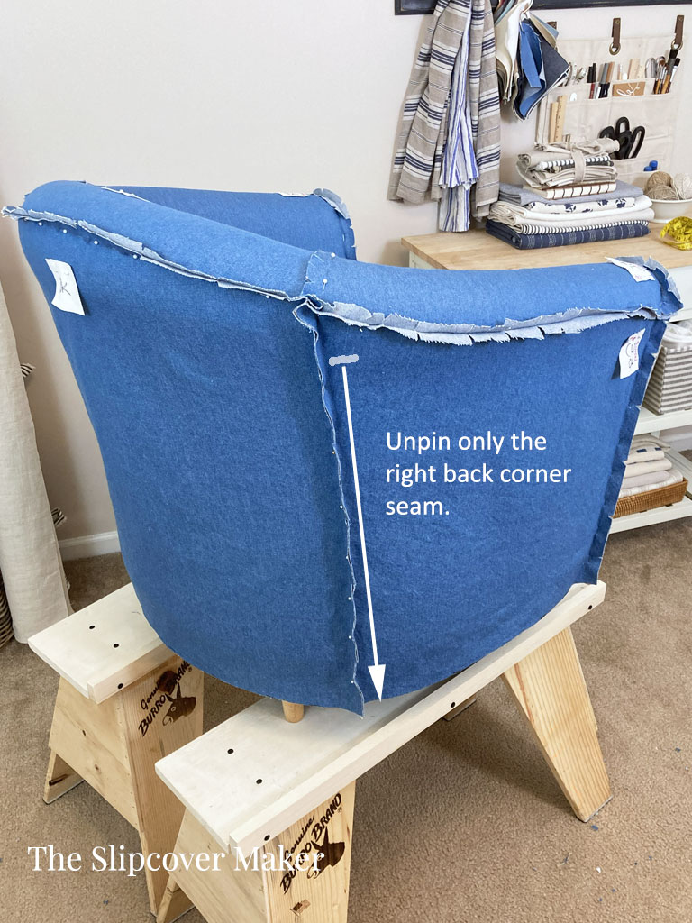 Unpin back corner seam of slipcover.